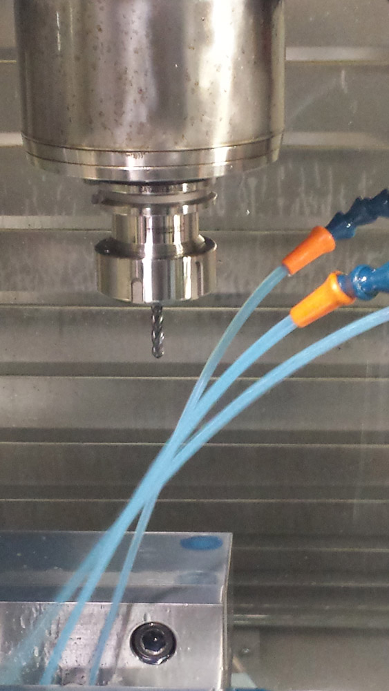 Another closeup view of new coolant spraying.