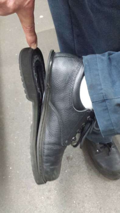 The sole of Dale's shoe is peeling off.