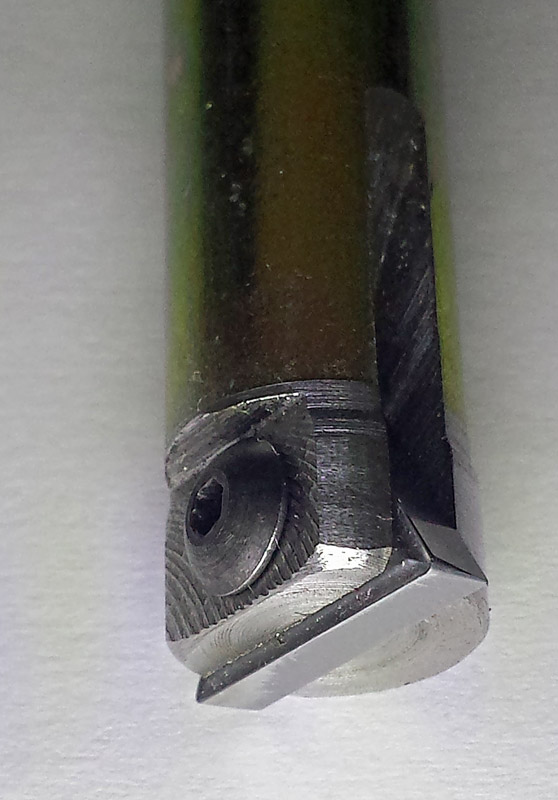 Close up view of a homemade dovetail cutter.