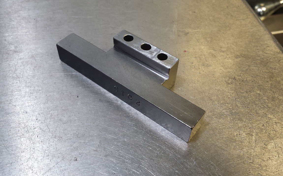 Alternate front stop piece that puts the stop below the vise jaw.