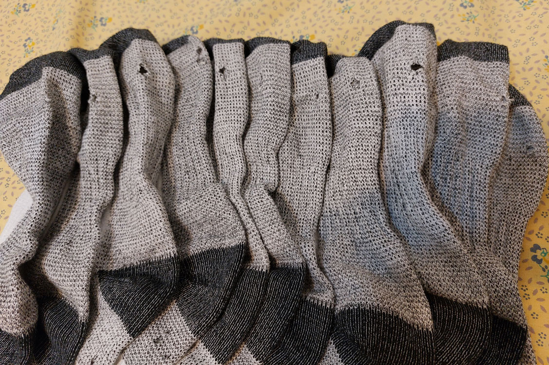 Ten socks that all have a hole in the same place.
